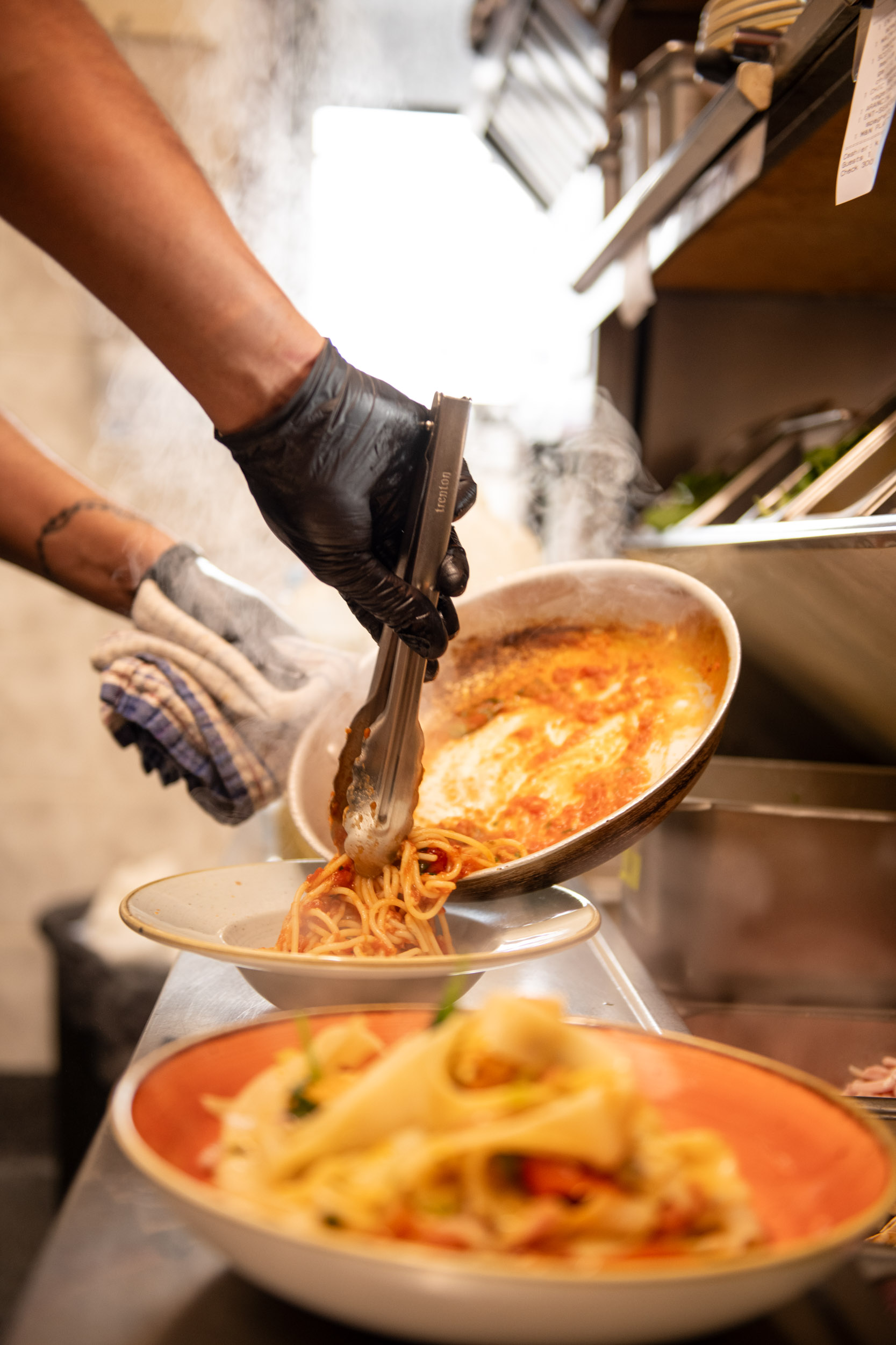 Someone cooking pasta.